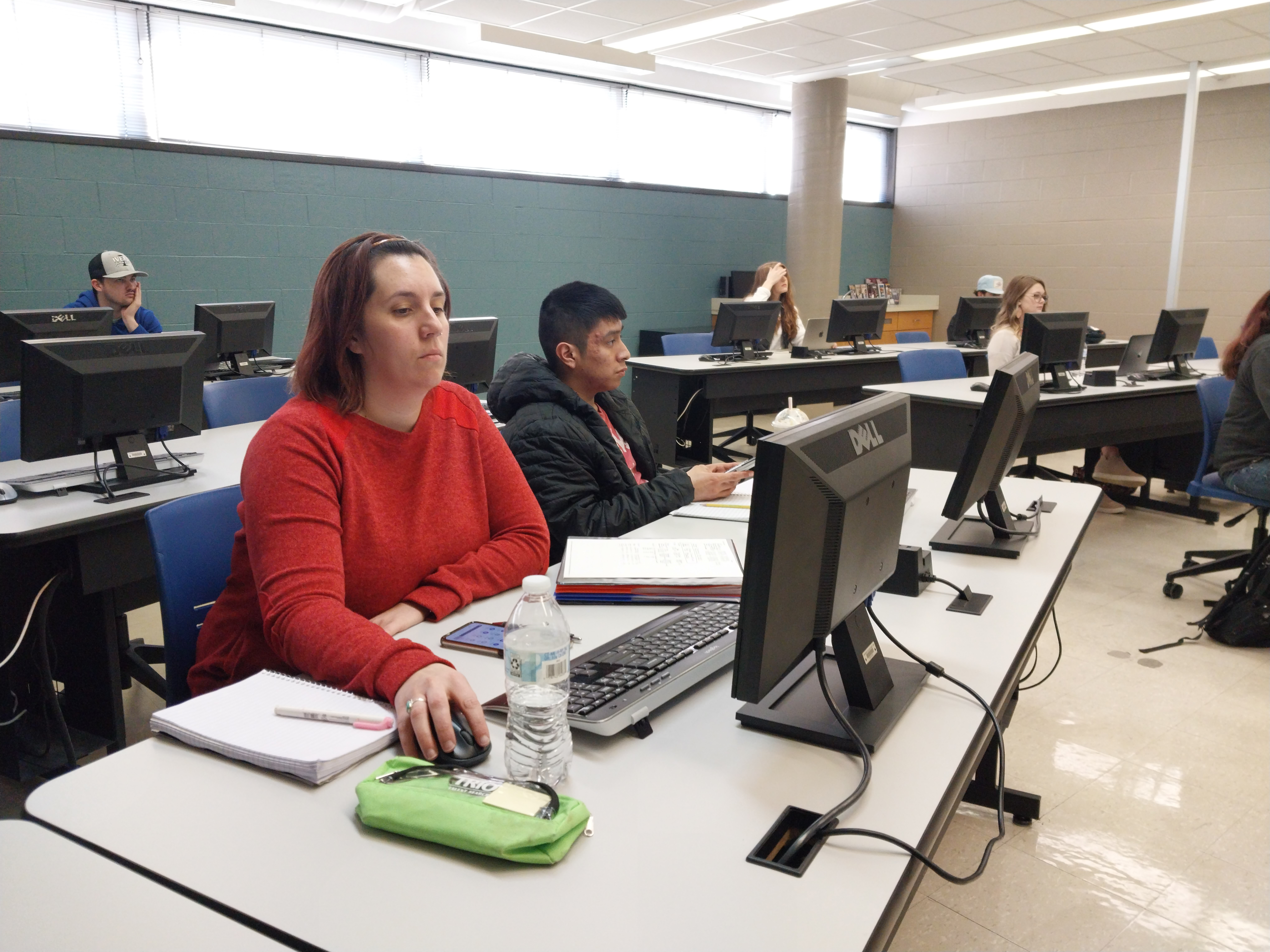 Students use desktop computers and review course materials in the accounting computer lab, while working on class projects.